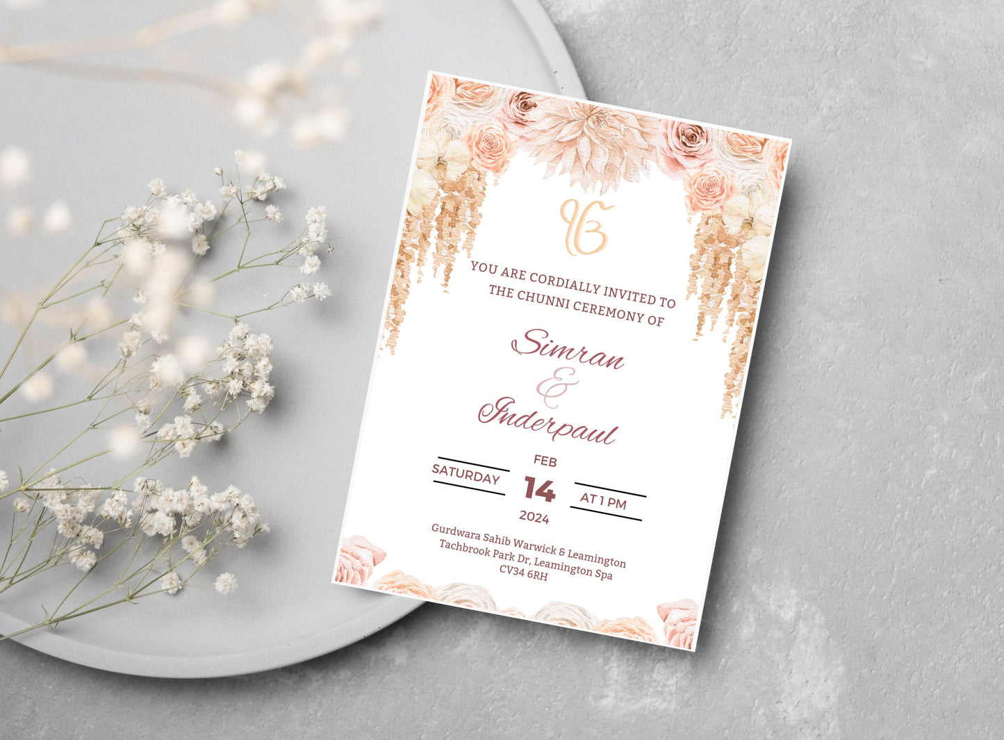 Elegant pink beige floral themed Roka invitation for couple. Flower graphic is centered top and bottom. The invite looks elegant and minimalist and contains all the text for the date time and location of event. Can edit all details on Canva.