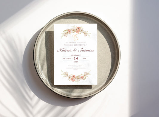 Elegant neutral beige floral themed Roka invitation for couple. Flower graphic is centered top and bottom. The invite looks elegant and minimalist and contains all the text for the date time and location of event. Can edit all details on Canva.